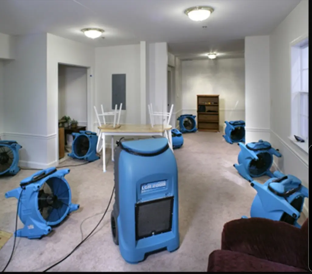 Air movers and dehumidifier setup for Water Damage Restoration in Highland Village